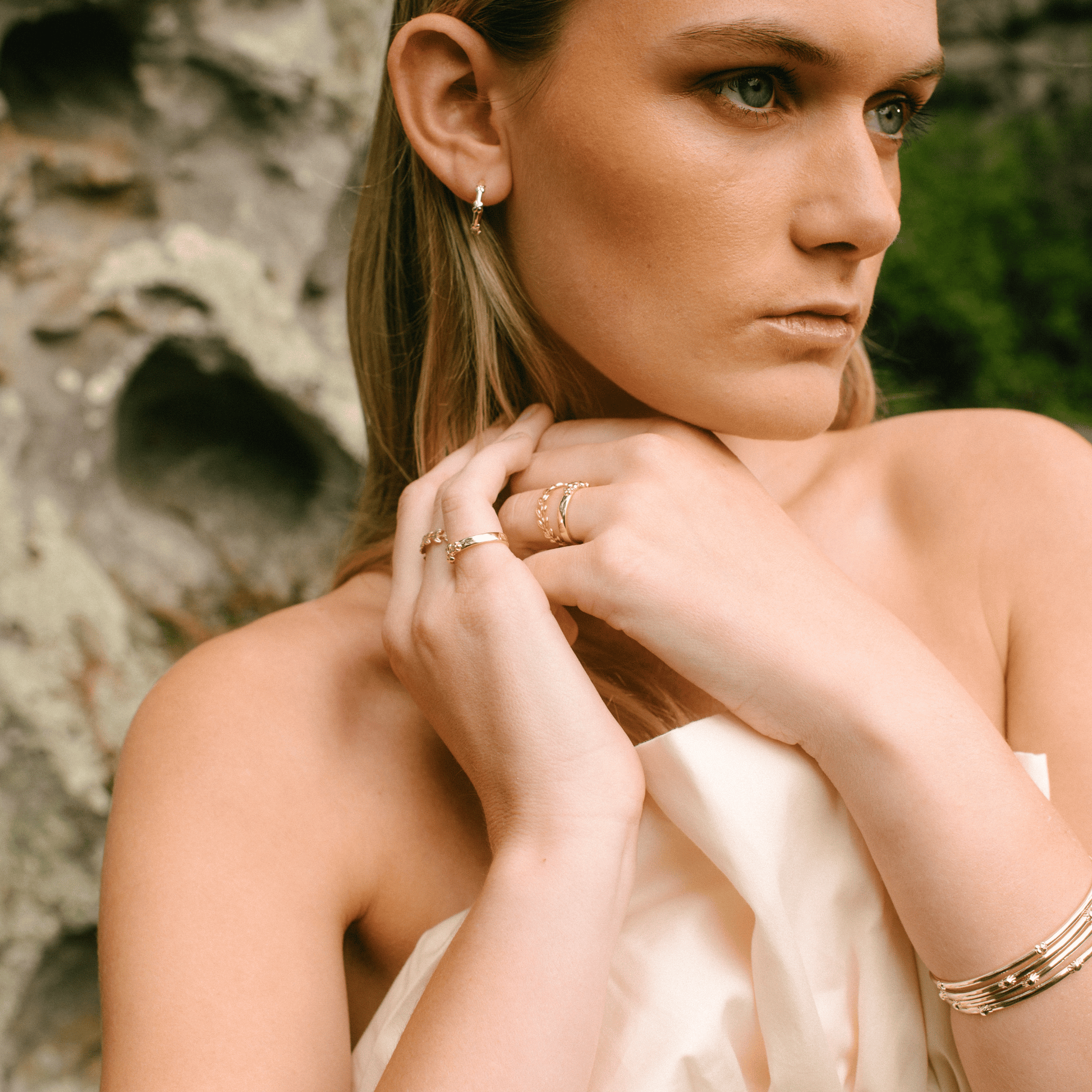 The hydrangea hoops on a woman's ear.